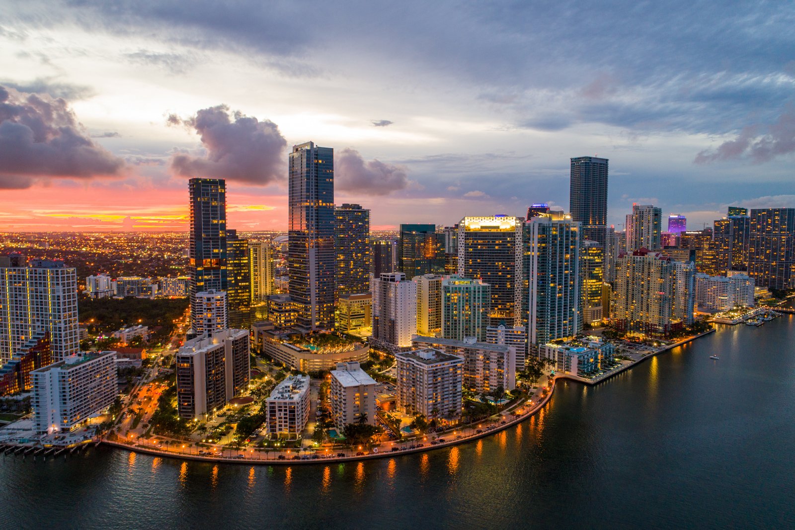 Aerial twilight in Brickell Downtown -- tourist attractions in Miami Florida. Your guide for all the top Miami attractions and best things to do in Miami. There are Plenty of tourist attractions in Miami Florida. This Guide presented by Flying and Travel.
